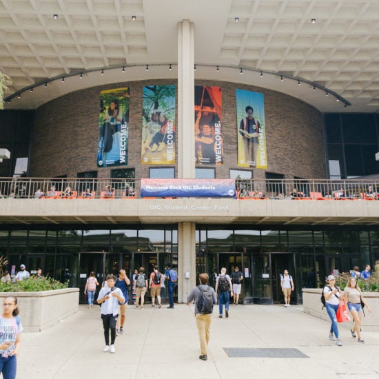 image of student center east and students walking nearby